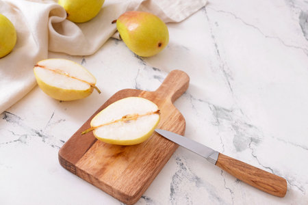 Fresh ripe pears on light background