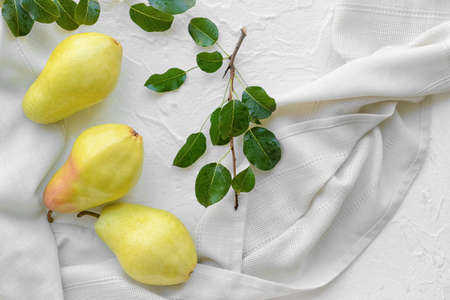 Composition with fresh pears on light backgroundの写真素材