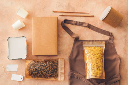 Packages for food and drinks on color background