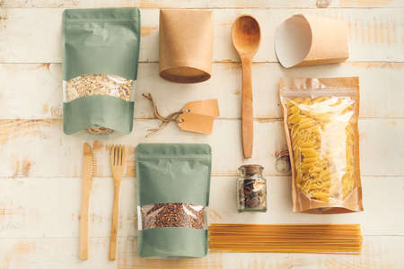 Packages for food on white wooden backgroundの写真素材