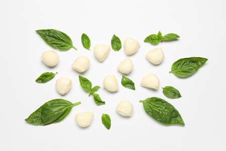 Composition with mozzarella cheese on white backgroundの写真素材