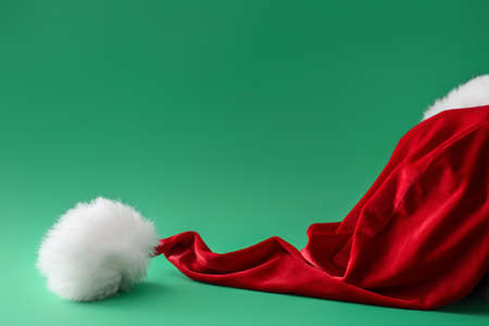 Santa hat on color backgroundの写真素材