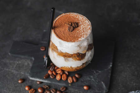 Sweet tasty tiramisu on tableの写真素材
