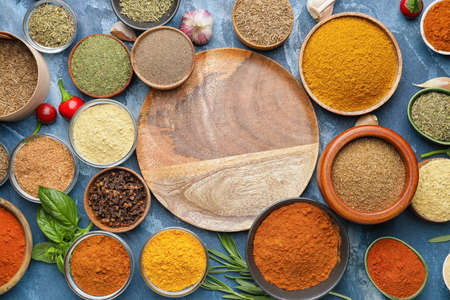 Composition with different spices on color background, closeupの写真素材