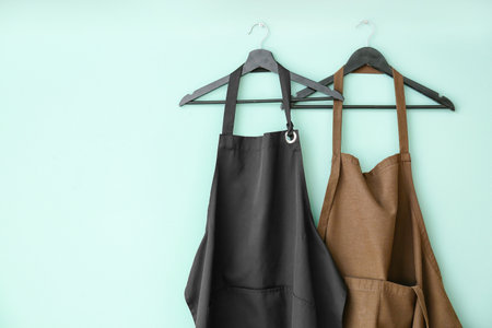 Clean aprons on color backgroundの写真素材
