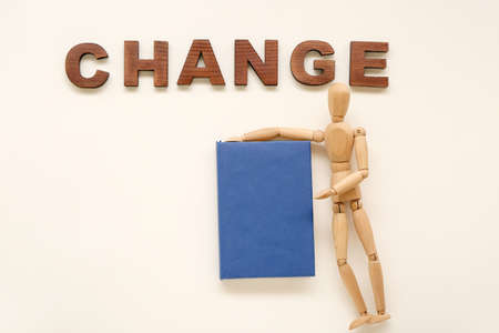 Wooden mannequin with word CHANGE on white backgroundの写真素材