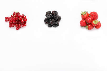 Different fresh berries on white backgroundの写真素材