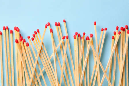 Many wooden matches on color backgroundの写真素材