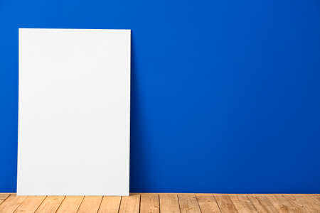 Blank poster near color wall