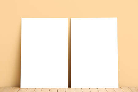 Blank posters near color wallの写真素材
