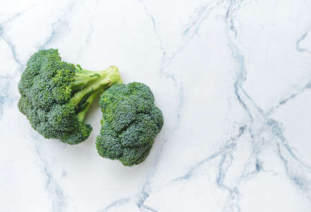 Fresh broccoli cabbage on light backgroundの写真素材