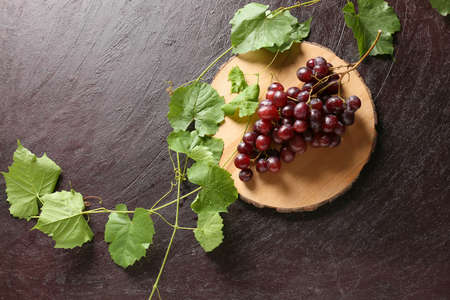 Sweet ripe grapes on tableの写真素材