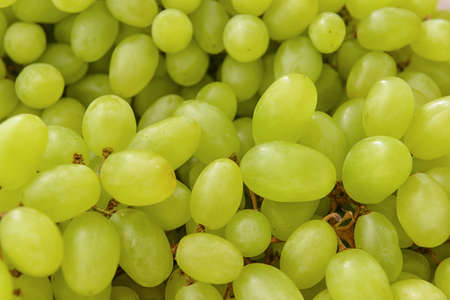 Ripe green grapes as background