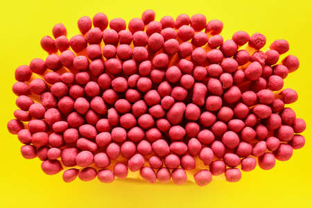 Many matches on color background, closeup