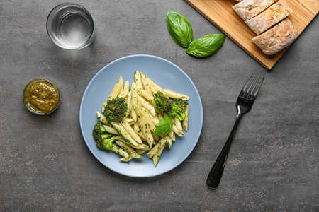 Delicious pasta with broccoli on dark backgroundの写真素材