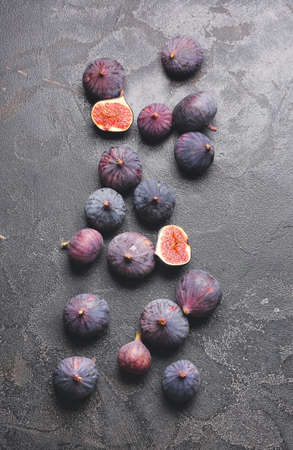 Fresh ripe figs on dark backgroundの写真素材