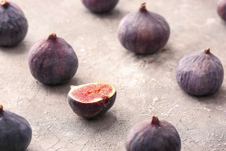 Fresh ripe figs on grunge background