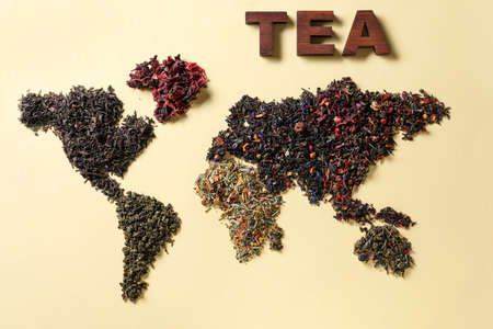 World map made of different sorts of tea on color backgroundの写真素材