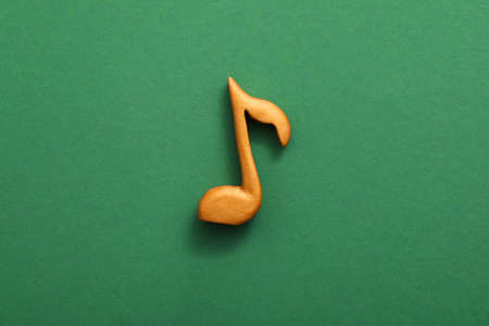 Music note on color background