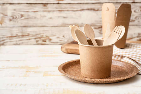 Eco tableware on table in kitchenの写真素材