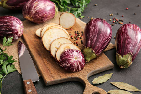 Fresh eggplants on dark backgroundの写真素材