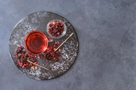Composition with hibiscus tea on tableの写真素材