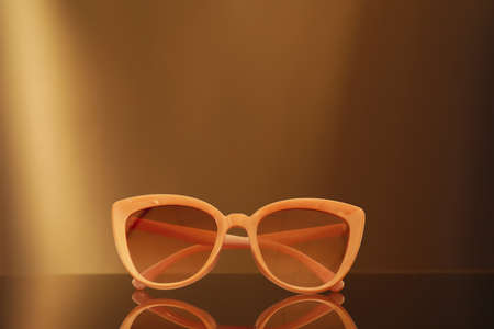 Stylish sunglasses on dark backgroundの写真素材