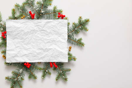 Beautiful Christmas decorations with empty card on white backgroundの写真素材