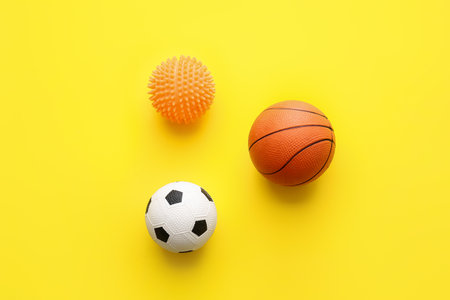 Different pet toys on color backgroundの写真素材