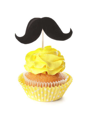 Tasty cupcake with stylish topper on white backgroundの写真素材