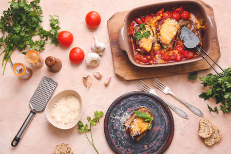 Dish of tasty baked vegetables on color backgroundの写真素材