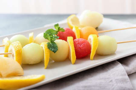 Fresh fruits on skewers, closeupの写真素材