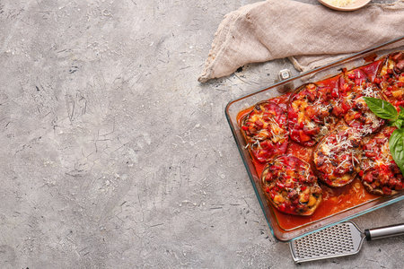 Dish of tasty baked vegetables on grunge backgroundの写真素材