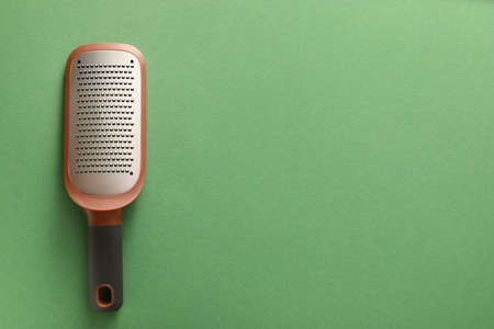 Metal grater on color backgroundの写真素材