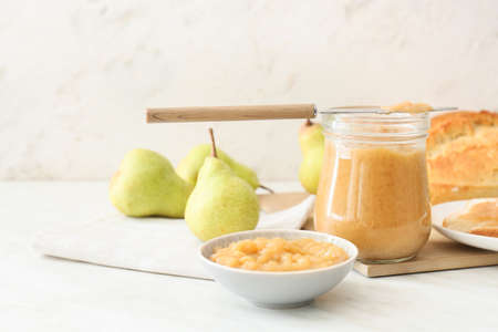 Tasty pear jam on white backgroundの写真素材