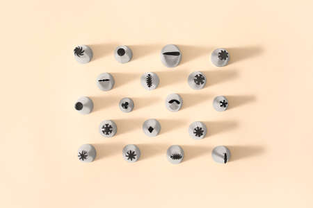 Different piping tips on color backgroundの写真素材