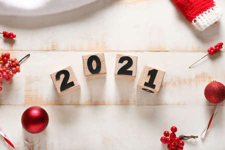 Christmas decor and cubes with figure 2021 on wooden backgroundの写真素材