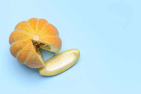 Sweet ripe melon on color backgroundの写真素材