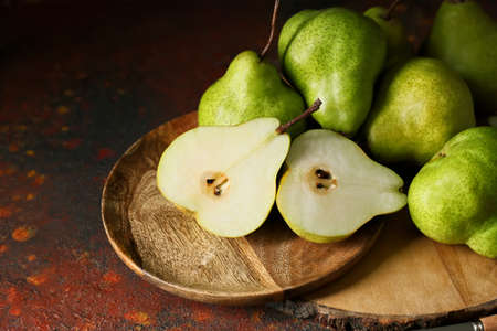 Fresh ripe pears on tableの写真素材