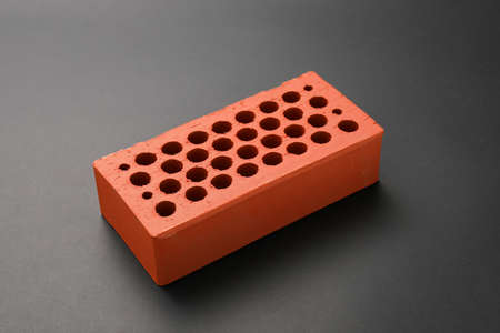 Brown brick on dark backgroundの写真素材