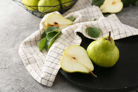 Fresh ripe pears on table