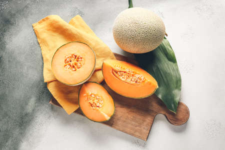 Composition with sweet ripe melon on tableの写真素材