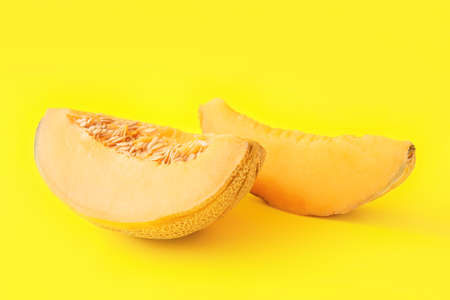 Sweet cut melon on color backgroundの写真素材