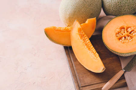 Sweet ripe melons on tableの写真素材