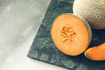 Sweet ripe melons on tableの写真素材