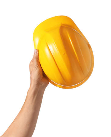 Hardhat in male hand on white backgroundの写真素材