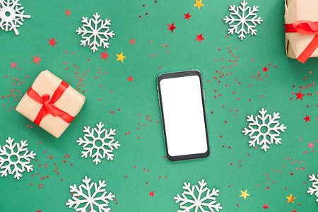 New year composition with mobile phone on color backgroundの写真素材