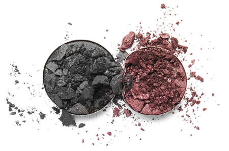 Crushed eyeshadows on white background
