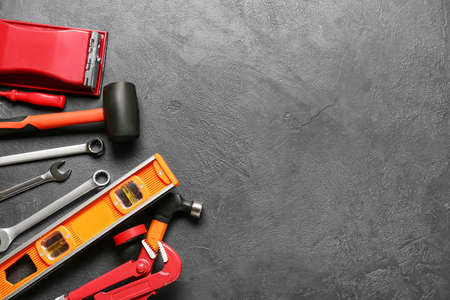 Set of construction tools on dark backgroundの写真素材