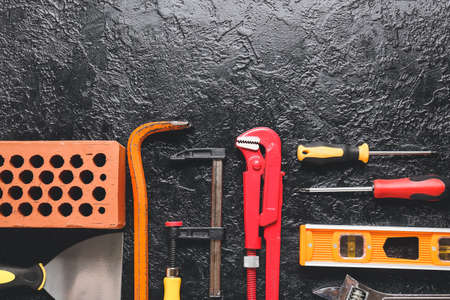 Set of construction tools on dark backgroundの写真素材